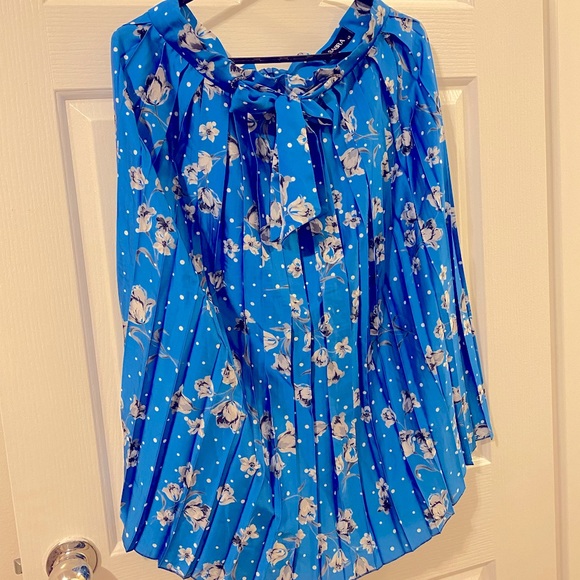 Dresses & Skirts - ✨Host Pick✨ Allover Pleated Floral Flutter Skirt